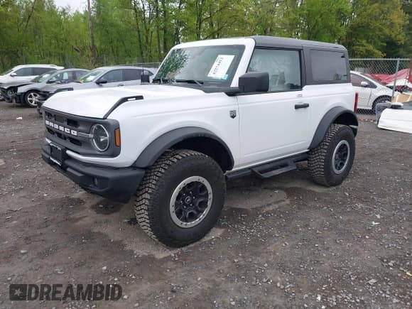 ✅ 2023 Ford Bronco • VIN: 1FMDE5CH6PLC11404 • Lot: 42274412. Listed on IAAI with 5,243 mi. Free auction sales archive from the USA and detailed vehicle history report at DreamBid. Image 2.