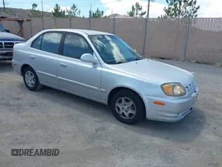 2003 Hyundai Accent GL with VIN KMHCG45C13U430017, listed as a IAAI auction lot 42625444 with 151,458 mi miles and . Bid and sale history available at DreamBid. Image 1.