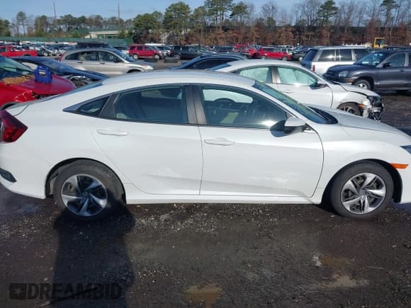 ✅ 2021 Honda Civic LX • VIN: 19XFC2F66ME200872 • Lot: 43809995. Listed on IAAI with 32,340 mi. Free auction sales archive from the USA and detailed vehicle history report at DreamBid. Image 13.