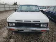 ✅ 1989 Nissan Hardbody • VIN: 1N6ND11S6KC399804 • Lot: 84070345. Wystawiony na Copart z przebiegiem 241 780 mil. Bezpłatny archiwum sprzedaży aukcyjnych z USA i szczegółowy raport historii pojazdu na DreamBid. Zdjęcie 5.