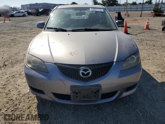 ✅ 2006 Mazda 3 i • VIN: JM1BK12G061468669 • Лот: 63051135. Опубликован ранее на Copart с пробегом 82 100 миль. Бесплатный доступ к архиву аукционных продаж из США и подробный отчёт об истории автомобиля на DreamBid. Изображение 5.