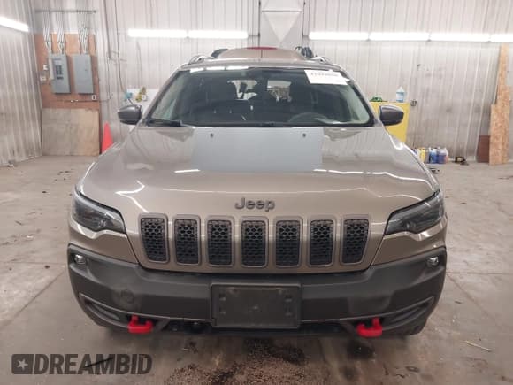 ✅ 2021 Jeep Cherokee Trailhawk • VIN: 1C4PJMBX5MD231018 • Lot: 42029850. Listed on IAAI with 66,525 mi. Free auction sales archive from the USA and detailed vehicle history report at DreamBid. Image 13.