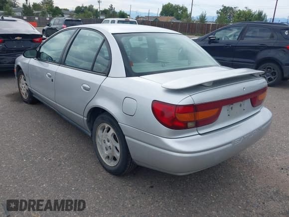 ✅ 2002 Saturn SL • VIN: 1G8ZK52712Z234973 • Лот: 43263075. Опубликован ранее на IAAI с пробегом 153 198 миль. Бесплатный доступ к архиву аукционных продаж из США и подробный отчёт об истории автомобиля на DreamBid. Изображение 3.