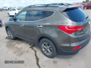 ✅ 2014 Hyundai Santa Fe • VIN: 5XYZUDLB1EG227778 • Lot: 43033757. Listed on IAAI with 135,496 mi. Free auction sales archive from the USA and detailed vehicle history report at DreamBid. Image 3.