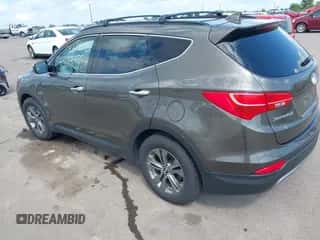 2014 Hyundai Santa Fe with VIN 5XYZUDLB1EG227778, listed as a IAAI auction lot 43033757 with 135,496 mi miles and . Bid and sale history available at DreamBid. Image 3.