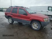 ✅ 2004 Jeep Grand Cherokee Laredo • VIN: 1J4GW48S84C382447 • Lot: 58721555. Listed on Copart with 169,954 mi. Free auction sales archive from the USA and detailed vehicle history report at DreamBid. Image 4.