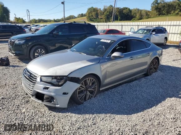 ✅ 2016 Audi A7 Premium Plus • VIN: WAUWGAFC4GN099543 • Lot: 87457625. Listed on Copart with 173,953 mi. Free auction sales archive from the USA and detailed vehicle history report at DreamBid. Image 1.
