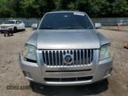 ✅ 2009 Mercury Mariner Premier • VIN: 4M2CU87G19KJ14006 • Lot: 63615445. Wystawiony na Copart z przebiegiem 216 941 mil. Bezpłatny archiwum sprzedaży aukcyjnych z USA i szczegółowy raport historii pojazdu na DreamBid. Zdjęcie 5.
