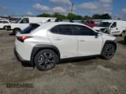 ✅ 2021 Lexus UX 250h • VIN: JTHX9JBH6M2052870 • Lot: 54749535. Listed on Copart with 62,800 mi. Free auction sales archive from the USA and detailed vehicle history report at DreamBid. Image 3.