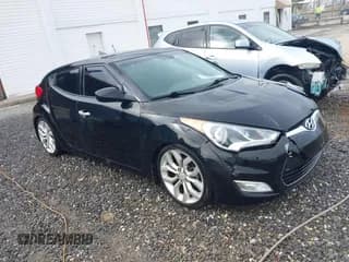 ✅ 2013 Hyundai Veloster w/Black Int • VIN: KMHTC6AD7DU092257 • Lot: 41464977. Wystawiony na IAAI z przebiegiem 151 152 mil. Bezpłatny archiwum sprzedaży aukcyjnych z USA i szczegółowy raport historii pojazdu na DreamBid. Zdjęcie 1.