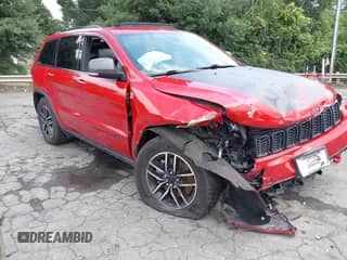 2021 Jeep Grand Cherokee Trailhawk with VIN 1C4RJFLGXMC579888, listed as a IAAI auction lot 42951354 with 76,948 mi miles and . Bid and sale history available at DreamBid. Image 1.