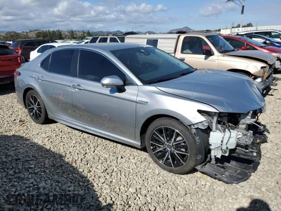 2021 Toyota Camry Hybrid SE с VIN 4T1G31AK5MU563311, выставлен на аукционе Copart как лот 84598085 с пробегом 85 740 миль миль и Списание • Salvage title. История ставок и продаж доступна на DreamBid. Изображение 4.