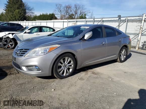 2013 Hyundai Azera с VIN KMHFG4JGXDA240841, выставлен на аукционе Copart как лот 82084474 с пробегом 168 746 миль миль и Списание • Salvage title. История ставок и продаж доступна на DreamBid. Изображение 1.