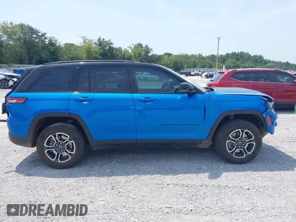 2022 Jeep Grand Cherokee Trailhawk with VIN 1C4RJYC68N8759961, listed as a IAAI auction lot 42589997 with 28,429 mi miles and . Bid and sale history available at DreamBid. Image 14.