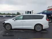 ✅ 2022 Chrysler Pacifica Hybrid Touring L • VIN: 2C4RC1L70NR121525 • Лот: 43166737. Опубликован ранее на IAAI с пробегом 98 309 миль. Бесплатный доступ к архиву аукционных продаж из США и подробный отчёт об истории автомобиля на DreamBid. Изображение 14.