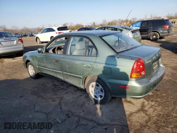 2005 Hyundai Accent GLS с VIN KMHCG45C85U588700, выставлен на аукционе Copart как лот 42792775 с пробегом 91 924 миль миль и Чистый • Clean title. История ставок и продаж доступна на DreamBid. Изображение 2.