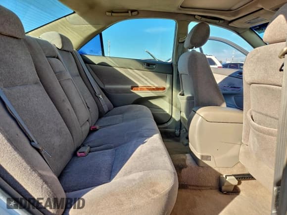 ✅ 2004 Toyota Camry LE • VIN: JTDBE32K640284234 • Лот: 85446115. Опубликован ранее на Copart с пробегом 122 187 миль. Бесплатный доступ к архиву аукционных продаж из США и подробный отчёт об истории автомобиля на DreamBid. Изображение 10.