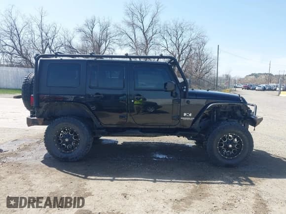 ✅ 2008 Jeep Wrangler Unlimited X • VIN: 1J4GA39188L518712 • Lot: 41993372. Wystawiony na IAAI z przebiegiem 128 278 mil. Bezpłatny archiwum sprzedaży aukcyjnych z USA i szczegółowy raport historii pojazdu na DreamBid. Zdjęcie 13.