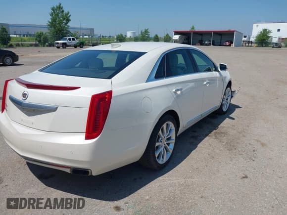 ✅ 2015 Cadillac XTS Luxury • VIN: 2G61N5S37F9157066 • Lot: 42548680. Wystawiony na IAAI z przebiegiem 83 929 mil. Bezpłatny archiwum sprzedaży aukcyjnych z USA i szczegółowy raport historii pojazdu na DreamBid. Zdjęcie 4.