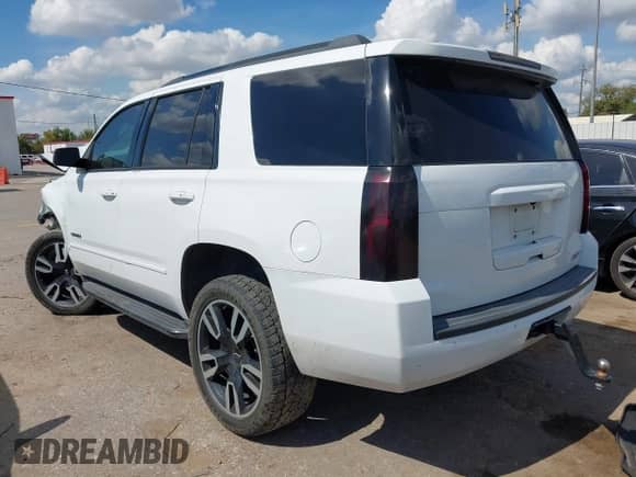 2020 Chevrolet Tahoe Premier with VIN 1GNSKCKJ8LR134496, listed as a IAAI auction lot 43360495 with 118,770 mi miles and . Bid and sale history available at DreamBid. Image 3.
