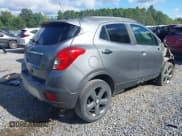 ✅ 2014 Buick Encore • VIN: KL4CJESB5EB693837 • Lot: 43060715. Listed on IAAI with 101,232 mi. Free auction sales archive from the USA and detailed vehicle history report at DreamBid. Image 4.