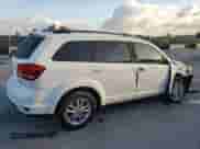 2015 Dodge Journey SXT z VIN 3C4PDCBG2FT610363, wystawiony jako Copart lot #86847885 z przebiegiem 128 271 mil mil oraz Szkoda całkowita • Salvage title. Historia ofert i sprzedaży dostępna na DreamBid. Obrazek 3.