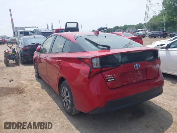 2022 Toyota Prius LE z VIN JTDL9MFUXN3035445, wystawiony jako IAAI lot #42475495 z przebiegiem 63 000 mil mil oraz . Historia ofert i sprzedaży dostępna na DreamBid. Obrazek 3.