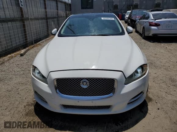 ✅ 2013 Jaguar XJ • VIN: SAJWA1C75D8V40541 • Lot: 62592345. Wystawiony na Copart z przebiegiem 70 159 mil. Bezpłatny archiwum sprzedaży aukcyjnych z USA i szczegółowy raport historii pojazdu na DreamBid. Zdjęcie 5.