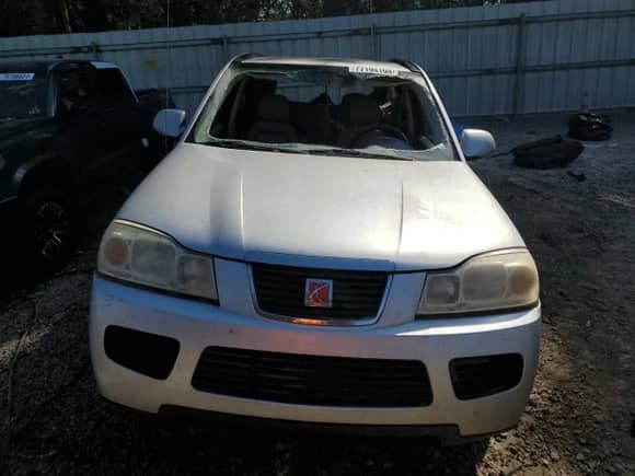 2007 Saturn VUE V6 z VIN 5GZCZ63467S824179, wystawiony jako Copart lot #77194104 z przebiegiem 221 843 mil mil oraz Nie do naprawy • Non repairable. Historia ofert i sprzedaży dostępna na DreamBid. Obrazek 5.