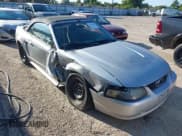 ✅ 2004 Ford Mustang Deluxe • VIN: 1FAFP44654F177454 • Лот: 42554208. Опубликован ранее на IAAI с пробегом 167 785 миль. Бесплатный доступ к архиву аукционных продаж из США и подробный отчёт об истории автомобиля на DreamBid. Изображение 1.