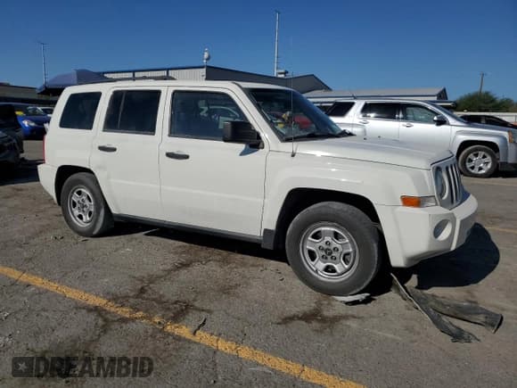 ✅ 2009 Jeep Patriot Sport • VIN: 1J4FT28A39D195618 • Lot: 71017635. Listed on Copart with 117,934 mi. Free auction sales archive from the USA and detailed vehicle history report at DreamBid. Image 4.