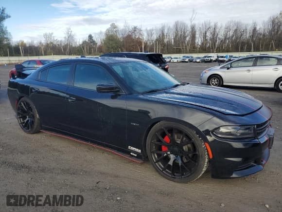 ✅ 2015 Dodge Charger RT • VIN: 2C3CDXCTXFH889849 • Lot: 82701745. Listed on Copart with 47,106 mi. Free auction sales archive from the USA and detailed vehicle history report at DreamBid. Image 4.