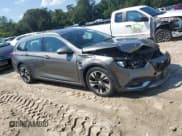 ✅ 2018 Buick Regal Essence • VIN: W04GV8SX4J1118762 • Lot: 62685375. Listed on Copart with 117,349 mi. Free auction sales archive from the USA and detailed vehicle history report at DreamBid. Image 4.