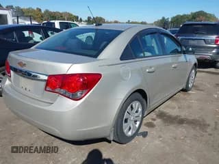 ✅ 2014 Chevrolet Cruze LS • VIN: 1G1PA5SH6E7165344 • Лот: 43513826. Опубликован ранее на IAAI с пробегом 64 739 миль. Бесплатный доступ к архиву аукционных продаж из США и подробный отчёт об истории автомобиля на DreamBid. Изображение 4.