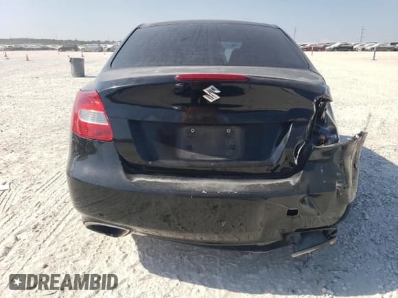 ✅ 2011 Suzuki Kizashi SE • VIN: JS2RE9A34B6111601 • Lot: 75945784. Listed on Copart with 128,926 mi. Free auction sales archive from the USA and detailed vehicle history report at DreamBid. Image 6.