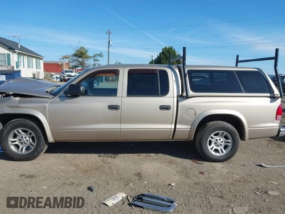 ✅ 2004 Dodge Dakota SLT • VIN: 1D7HL48N14S682517 • Lot: 43673584. Listed on IAAI with 169,891 mi. Free auction sales archive from the USA and detailed vehicle history report at DreamBid. Image 14.