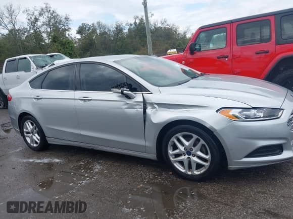 ✅ 2016 Ford Fusion SE • VIN: 3FA6P0H71GR331371 • Lot: 43761726. Listed on IAAI with 218,242 mi. Free auction sales archive from the USA and detailed vehicle history report at DreamBid. Image 13.