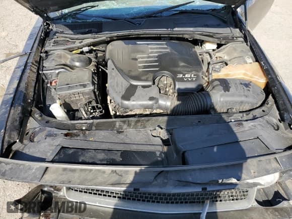 ✅ 2014 Dodge Challenger SXT • VIN: 2C3CDYAG9EH108927 • Lot: 69865674. Wystawiony na Copart z przebiegiem 130 196 mil. Bezpłatny archiwum sprzedaży aukcyjnych z USA i szczegółowy raport historii pojazdu na DreamBid. Zdjęcie 11.