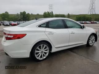 ✅ 2013 Hyundai Azera • VIN: KMHFH4JG6DA206540 • Лот: 59350095. Опубликован ранее на Copart с пробегом 65 579 миль. Бесплатный доступ к архиву аукционных продаж из США и подробный отчёт об истории автомобиля на DreamBid. Изображение 3.