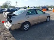 ✅ 2005 Toyota Camry LE • VIN: 4T1BE30K65U959315 • Lot: 42013123. Wystawiony na IAAI z przebiegiem 69 468 mil. Bezpłatny archiwum sprzedaży aukcyjnych z USA i szczegółowy raport historii pojazdu na DreamBid. Zdjęcie 4.