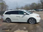 ✅ 2014 Honda Odyssey Touring • VIN: 5FNRL5H94EB057681 • Lot: 41828000. Listed on IAAI with 249,350 mi. Free auction sales archive from the USA and detailed vehicle history report at DreamBid. Image 14.