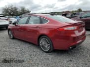 ✅ 2014 Ford Fusion Titanium • VIN: 3FA6P0D97ER125699 • Лот: 82249625. Опубликован ранее на Copart с пробегом 167 083 миль. Бесплатный доступ к архиву аукционных продаж из США и подробный отчёт об истории автомобиля на DreamBid. Изображение 2.