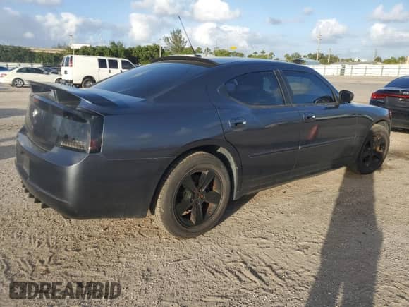 2008 Dodge Charger SXT с VIN 2B3KA33G18H144715, выставлен на аукционе Copart как лот 77578504 с пробегом 158 834 миль миль и Списание • Salvage title. История ставок и продаж доступна на DreamBid. Изображение 3.