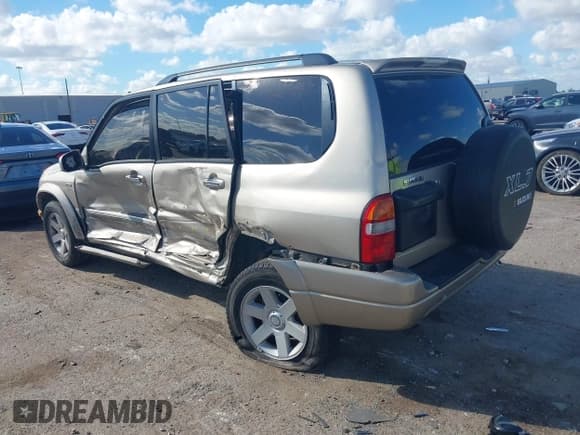 ✅ 2003 Suzuki XL7 Touring • VIN: JS3TX92V934102093 • Lot: 43710578. Listed on IAAI with 89,189 mi. Free auction sales archive from the USA and detailed vehicle history report at DreamBid. Image 3.