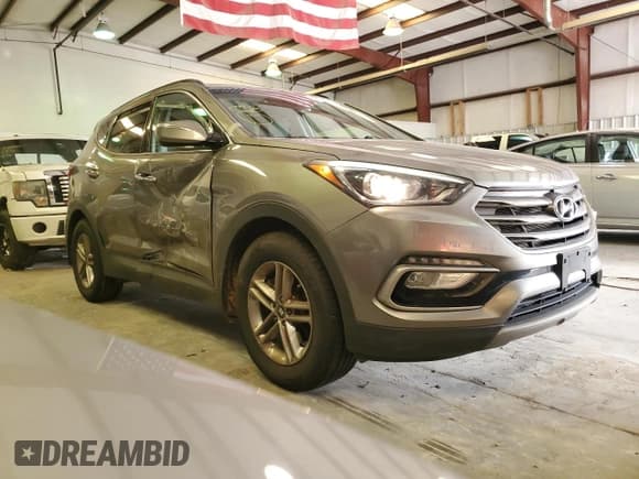 ✅ 2017 Hyundai Santa Fe 2.4L • VIN: 5NMZUDLB6HH048811 • Лот: 60130573. Опубликован ранее на Copart с пробегом 70 018 миль. Бесплатный доступ к архиву аукционных продаж из США и подробный отчёт об истории автомобиля на DreamBid. Изображение 4.