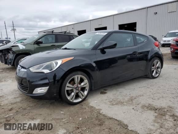 ✅ 2013 Hyundai Veloster w/Gray Int • VIN: KMHTC6AD9DU162356 • Лот: 71284144. Размещён на Copart с пробегом 118 439 миль миль. Получите бесплатный доступ к архиву аукционных продаж из США и посмотрите подробный отчёт об истории автомобиля на DreamBid. Изображение 1.