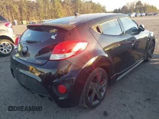 ✅ 2014 Hyundai Veloster Turbo • VIN: KMHTC6AE7EU203769 • Lot: 41215456. Wystawiony na IAAI z przebiegiem 113 983 mil. Bezpłatny archiwum sprzedaży aukcyjnych z USA i szczegółowy raport historii pojazdu na DreamBid. Zdjęcie 4.