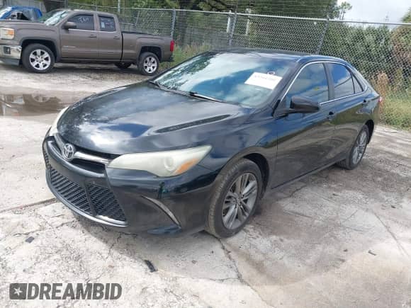 2016 Toyota Camry SE with VIN 4T1BF1FK5GU579815, listed as a IAAI auction lot 43561200 with 98,570 mi miles and . Bid and sale history available at DreamBid. Image 2.