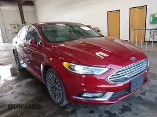 ✅ 2017 Ford Fusion Hybrid Titanium • VIN: 3FA6P0RUXHR158259 • Lot: 42463561. Listed on IAAI with 206,211 mi. Free auction sales archive from the USA and detailed vehicle history report at DreamBid. Image 1.