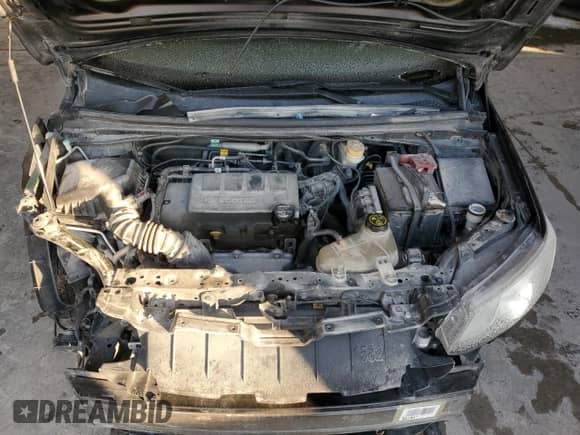 2020 Chevrolet Sonic Premier with VIN 1G1JF6SB9L4100446, listed as a Copart auction lot 87485154 with 84,883 mi miles and Salvage title. Bid and sale history available at DreamBid. Image 12.